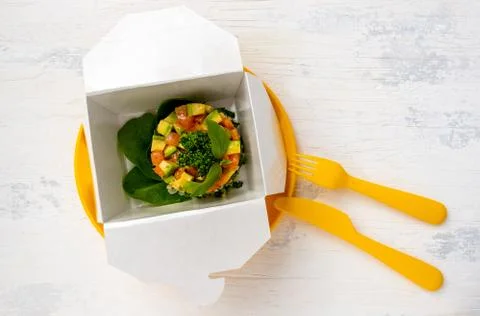 Portion of the salad from the quick delivery Stock Photos