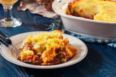 Portion of shepherd's pie or cottage pie on a plate Stock Photos