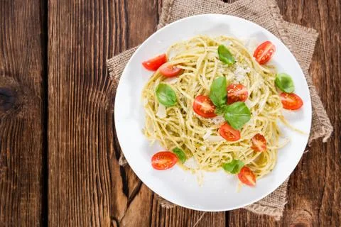 Portion of spaghetti with pesto Stock Photos