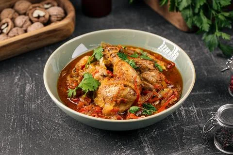 Portion of stewed chicken Stock Photos