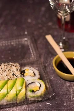 A portion of sushi with avocado wrapper Stock Photos