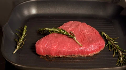 Portion of tender lean beef steak grilling Stock Footage 105106941