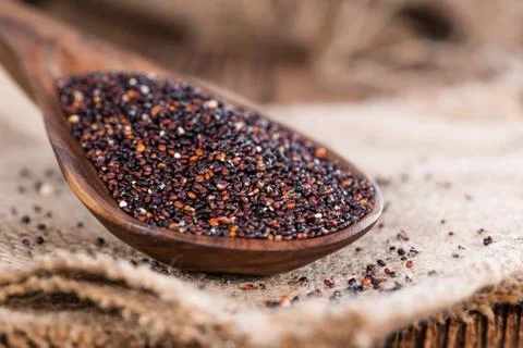 Portion of uncooked black Quinoa Stock Photos