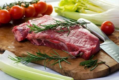 Portion of uncooked lean healthy beef steak Stock Photos