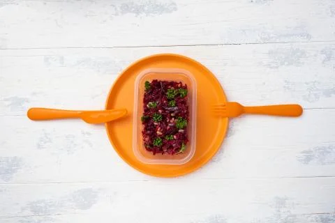 A portion of vinaigrette in a plastic box Stock Photos