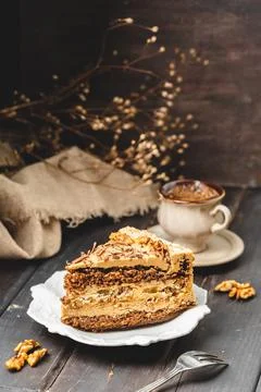 A Portion of Walnut Cake Served on the Plate Stock-Fotos