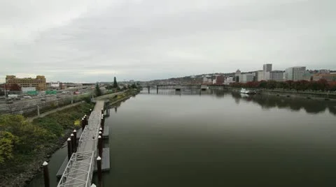 Portland Oregon City Skyline with Freeway and Cyclists Walkway Bridge Stock Footage
