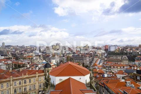 Porto city sky in Portugal, seen from the rooftops. Stock Photos