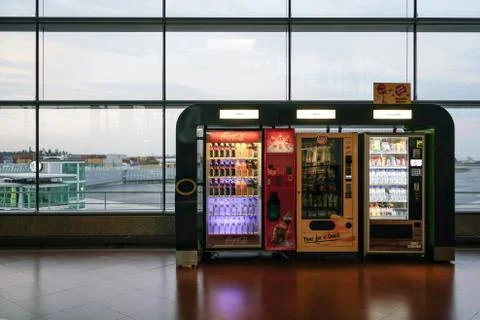 Porto, October 2019 - Drinks, snacks and chocolates vending machine in airport Stock Photos