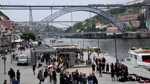 Porto Ribeira Square (Praca de Ribeira), river Douro, Dom Luis Bridge, Portugal Stock Footage 75820861