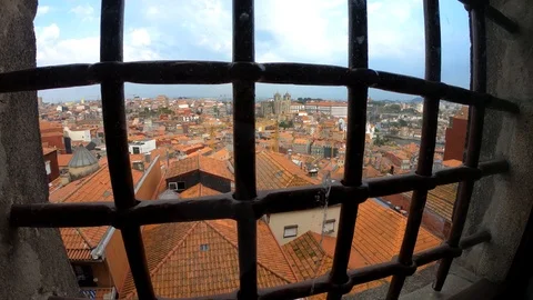 PORTO THROUGH AN OLD WINDOW WITH METAL BARS Stock Footage 95093801