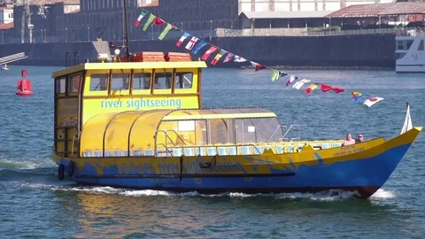 Porto tourist rabelo traditional boat trip river tour Portugal slow motion Stock Footage