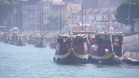 Porto tourist rabelo traditional boat trip river tour Portugal slow motion Stock Footage