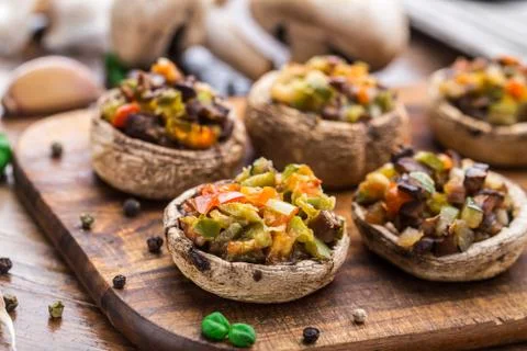 Portobello mushrooms stuffed with vegetables Stock Photos