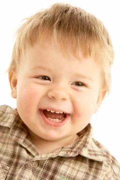 Portraigt Of Laughing Toddler Stock Photos