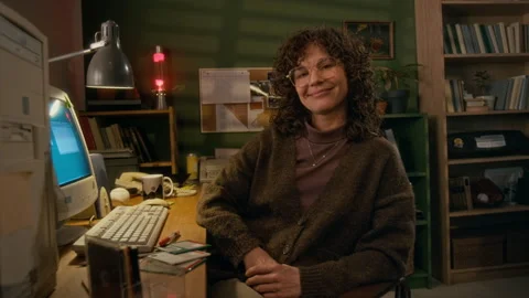 Portrait of 90s Female Programmer Next to Retro Computer in Cozy Home Office Stock Footage 327239131