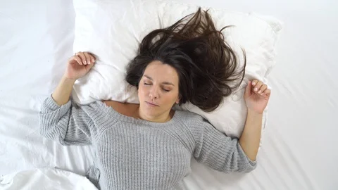 Portrait from above of cute plus size model smiling during the morning light. Video stock 119713775