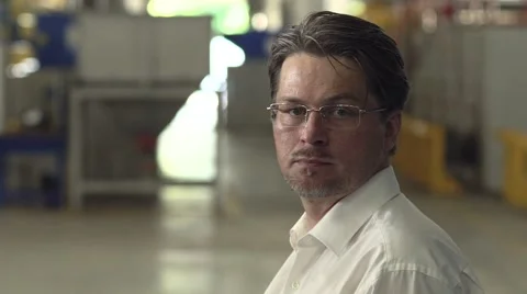 Portrait of adult man looking at camera Stock Footage 65458114