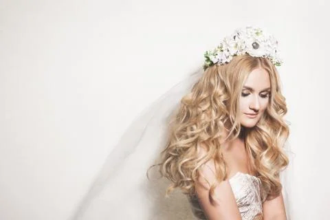Portrait of affectionate blond bride. wedding makeup and hairdo. wedding deco Stock Photos