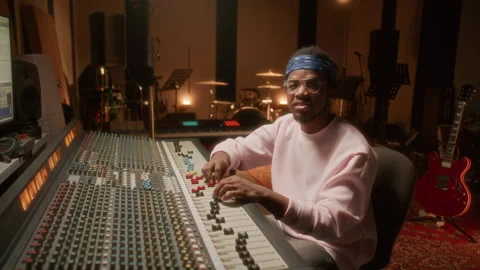 Portrait of African American Audio Engineer Working in Recording Studio Stock Footage 334366716