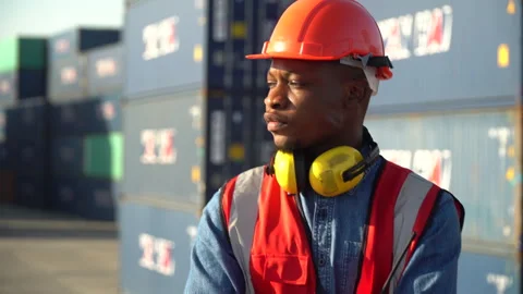 Portrait  of african american container worker confident and smiling standi.. Stock Footage 242310693
