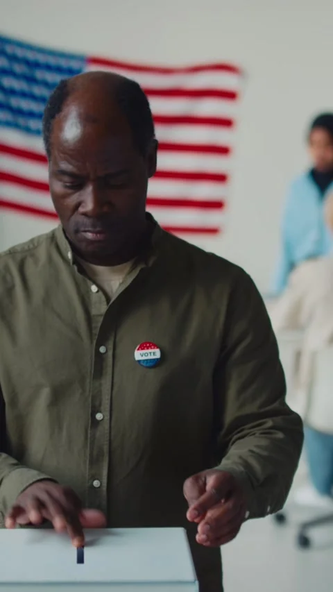 Portrait of African American Man Casting Ballot in Local Elections Stock Footage 244866653