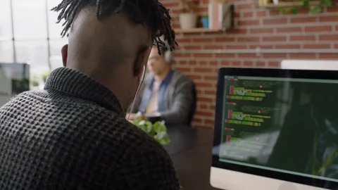 Portrait african american man programmer coding network security software for Stock Footage 96903198