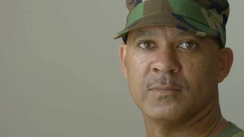 Portrait of an African American man wearing military fatigues Stock Footage