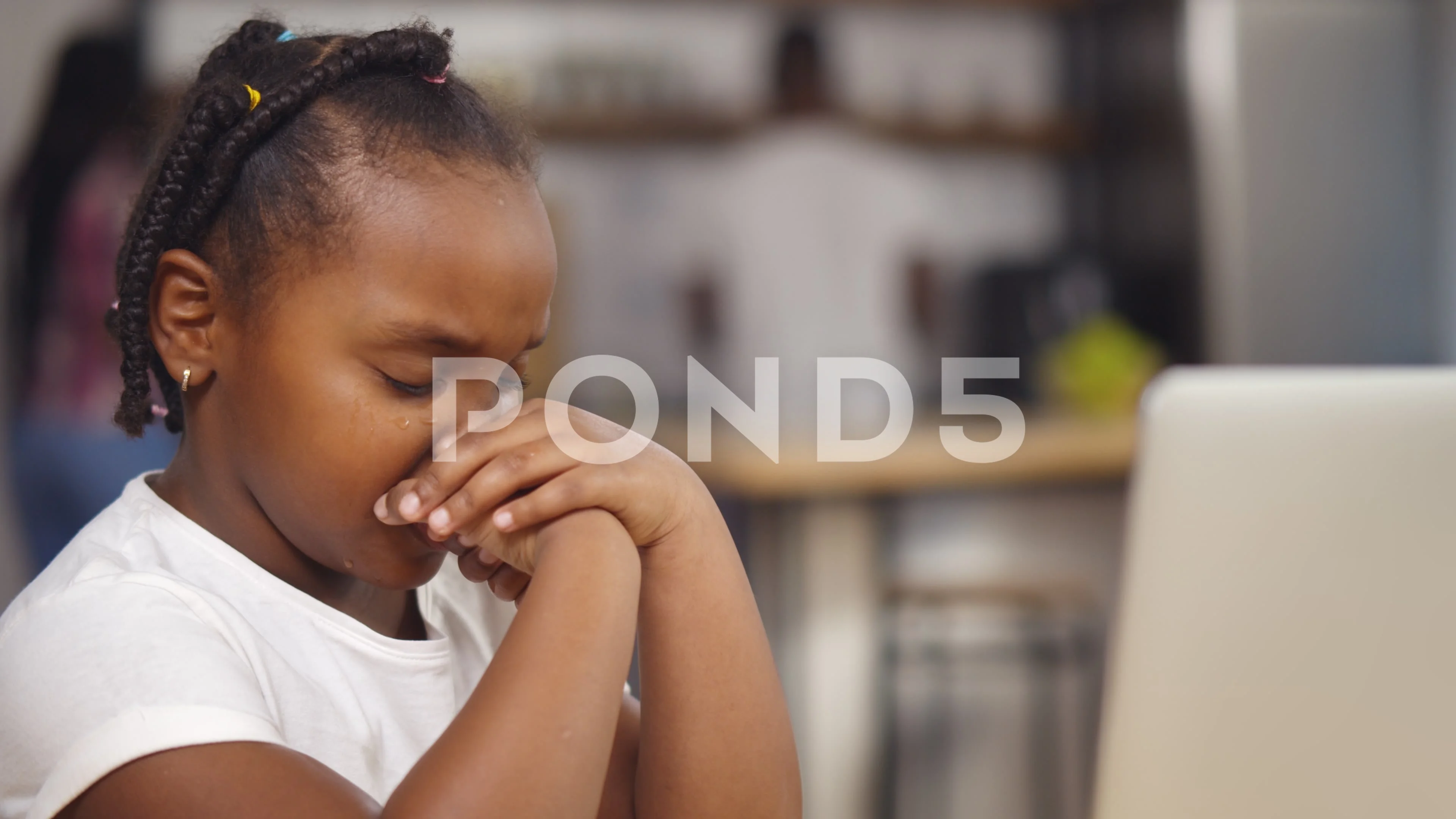 sad black child crying