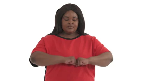 Portrait of african oversize model twisting her upper body side to side isolated Stock Footage 134572951