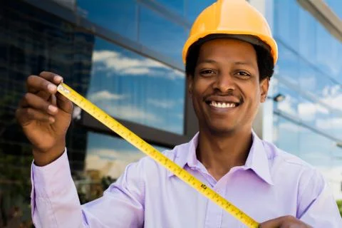 Portrait of Afro american architect in hard hat Stock Photos