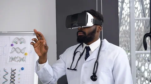 Portrait of Afro american scientist using and testing virtual reality glasses Stock Footage 125447783