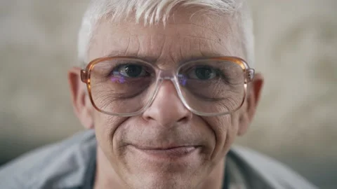 Portrait of aged man in glasses Stock Footage 157555592