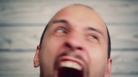 Portrait of an aggressive maniac with an axe Stock Footage 94822598