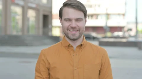 Portrait of Agree Young Man Shaking Head in Approval Outdoor 스톡 동영상 202089281