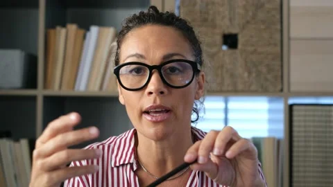Portrait and close up of one old woman talking to the camera in video conference Vídeo Stock 151322249