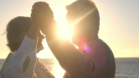 Portrait and close up of two happy in love seniors dancing smiling with the sun  Stock Footage 151333335