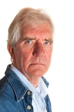 Portrait of an angry elderly man Stock Photos