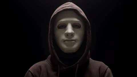 Portrait of a anonymous hacker in a mask and a hoodie. Stock Footage 290430650