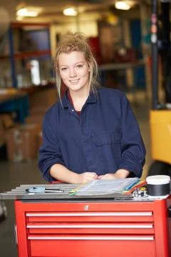 Portrait of apprentice engineer in factory Stock Photos