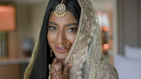 Portrait Of An Arab Bride. She Covers Her Face With Veil. Smiling Pretty Young Video stock 153833699