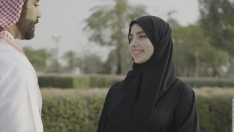 Portrait of an arab couple talking in the park. Stock Footage 303638207