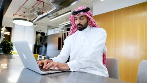 Portrait of an arab man working on a laptop. Video stock 237087640