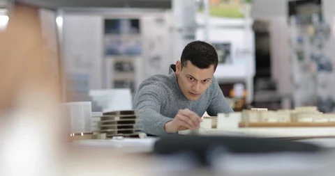 Portrait of Architect with model Stock Footage 86806292