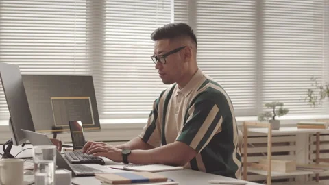 Portrait of Asian Developer at Workplace Stock Footage 195981279