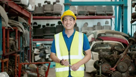 Portrait of asian Engineering man is working in heavy industrial plant Engine Stock Footage 152831885