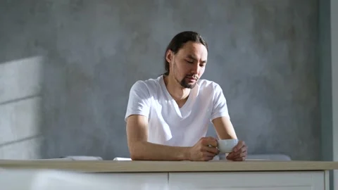 Portrait of asian man drinking coffee in the morning at home 스톡 동영상 151899836