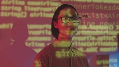 Portrait of Asian Programmer with Programming Codes on Face Stock Footage 165726648