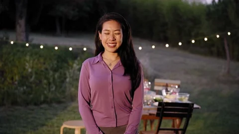 Portrait of an asian waitress looking at the camera. Chinese female restaurant Stock Footage 200831240