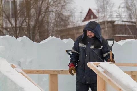 Portrait of an assembler in a blue jacket 스톡 사진